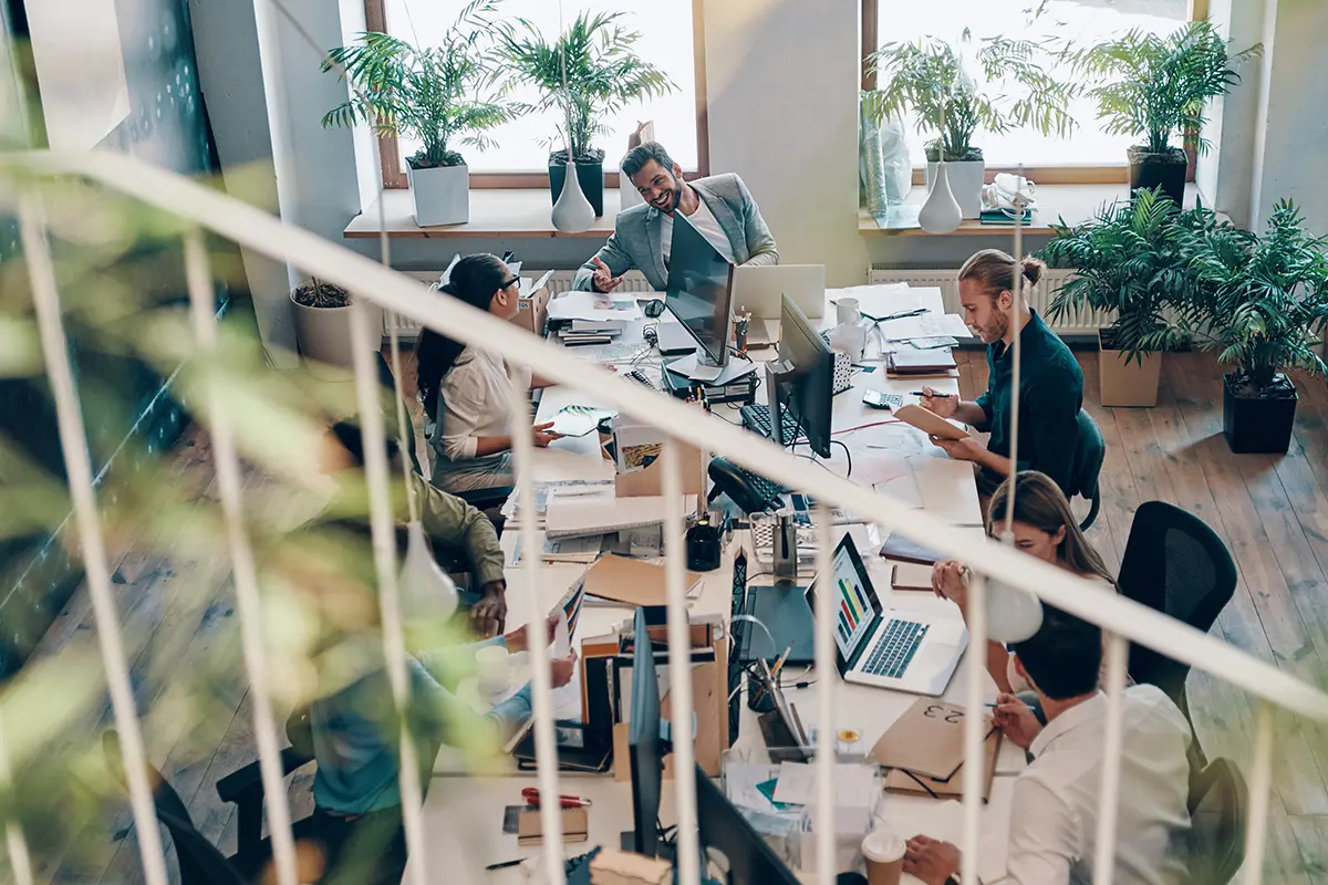 top view of office showing people working on computers