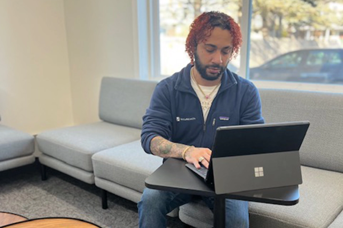 SecureWon engineer using a laptop