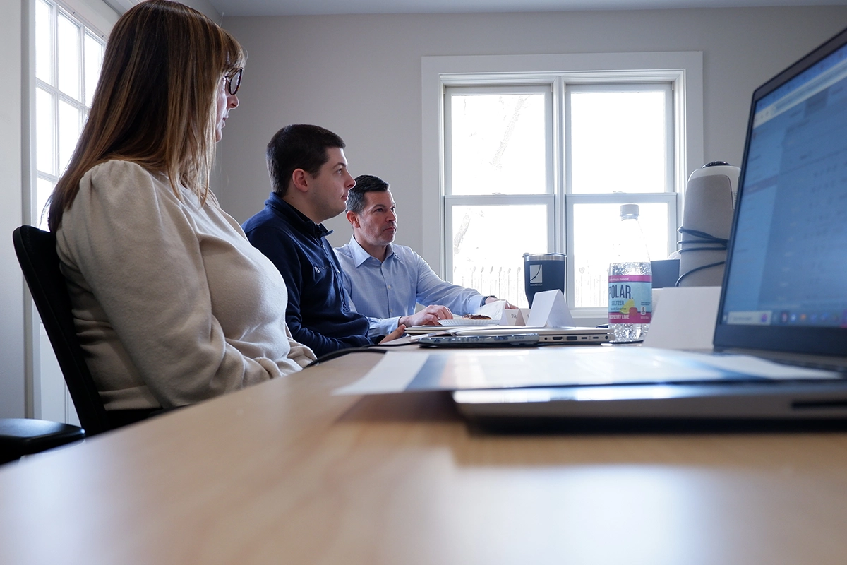 Fully managed IT Support - Close up shot of Securewon team in a meeting